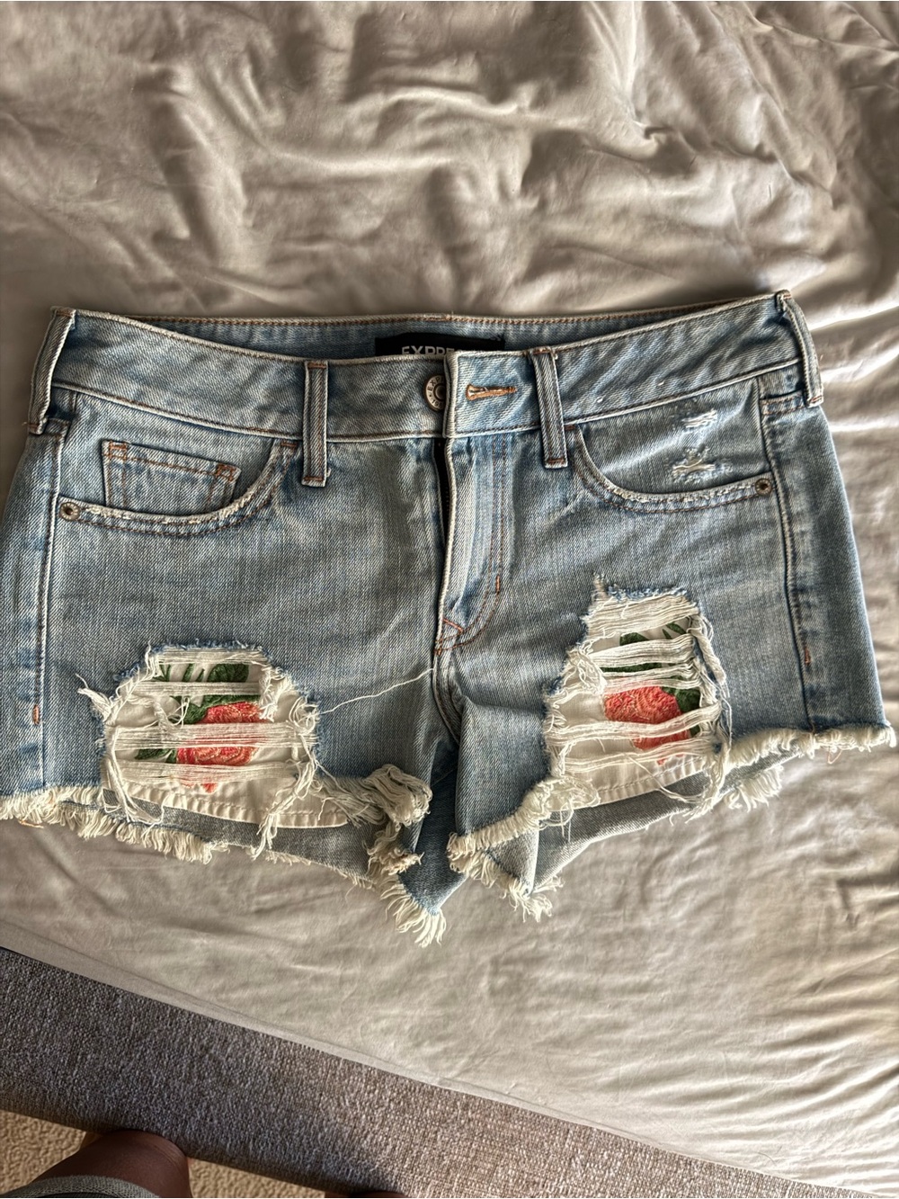 Express Light Wash Distressed Denim Shorts with Floral Inserts